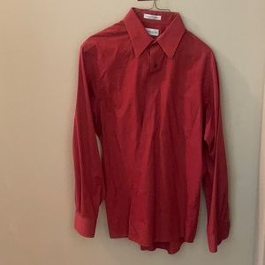 Button up shirt kinda orangish